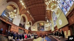 Netherlands - Judges enter as the delegations of Iran and the U.S. stand up at the International Court of Justice in The Hague, February 13, 2019.