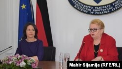German Foreign Minister Annalena Baerbock (left) with her Bosnian counterpart, Bisera Turkovic, in Sarajevo on March 10. 