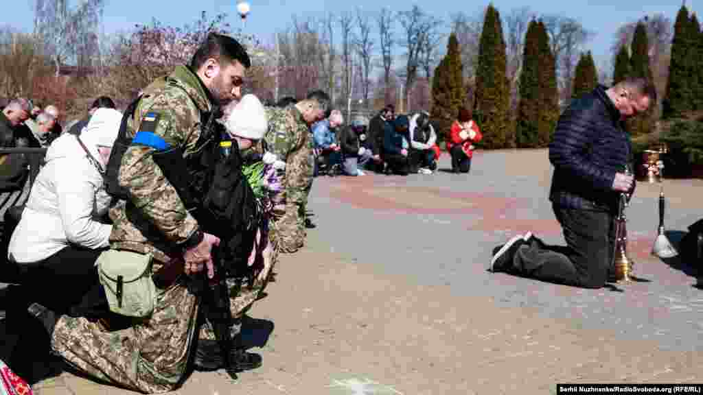 Прощання з полковником ЗСУ Валерієм Гудзем, який загинув внаслідок атаки російських військ на Луганщині. Київська область, 15 березня 2022 року
