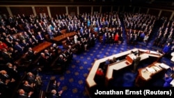 Президент України Володимир Зеленський (за трибуною) під час виступу в Конгресі США. Вашингтон, 21 грудня 2022 року