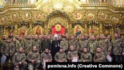 Ուկրաինական ուղղափառ եկեղեցու առաջնորդ Էպիֆանի միտրոպոլիտը զինվորականների հետ, Կիև, 6-ը հունվարի, 2023թ. 