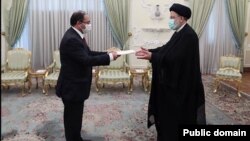 Iran - New Armenian Ambassador Arsen Avagian hands his credentials to Iranian President Ebrahim Raisi, Tehran, April 25, 2022.