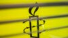 The Amnesty International logo is seen in their office in Hong Kong on October, 2021.