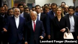 موگرینی، آمانو و ظریف در روز اجرایی شدن برجام