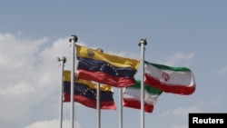 Both Venezuela and Iran have been subjected to U.S. sanctions.