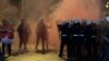 Protesters and police clash in the Montenegrin capital, Podgorica, on December 12. 