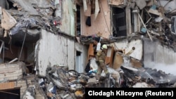 Наслідки ракетного удару армії РФ по житловому будинку в Дніпрі, 14 січня 2022 року