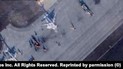 Результати української атаки на російську авіабазу «Енгельс-2​​​​​​» 5 грудня 2022 року. Супутникове фото