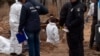 Ukraine Exhumes Bucha Victims For Forensic Tests, Reburial video grab 1