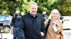 Sebija Izetbegovic (right) arrives with her husband to cast their votes in elections in Sarajevo in October 2022. 
