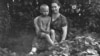 A young Vladimir Putin with his mother, Maria Ivanovna Putina.