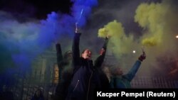 Учасниця акції у Варшаві