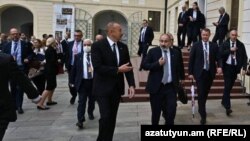 Czech Republic - Armenian Prime Minister Nikol Pashinian and Azerbaijani President Ilham Aliyev talk during an EU summit in Prague, October 6, 2022.