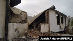 A house lies damaged following violent clashes in Kyrgyzstan's Batken district near the border with Tajikistan last month. 