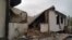 A house lies damaged following violent clashes in Kyrgyzstan's Batken district near the border with Tajikistan last month. 