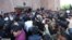 Armenian police prevented protesters from entering the mayor's building on May 11 before they blocked access.