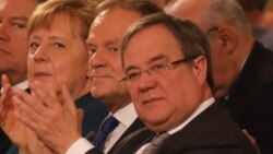 Канцлерка Ангела Меркель Angela Merkel, президент Європейської комісії Дональд Туск, і тодішній керівник землі Рейн-Вестфалія Армін Лашет