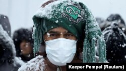 Мігранти на кордоні Білорусі й Польщі, 23 листопада 2021 року