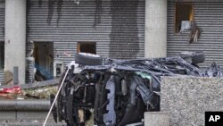 Ослодогу жардыруу маалында 7 киши өлүп, бир автоунаа ойрон болду. AP. 22.7.2011.