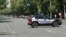 Armenia - Police cars parked on Yerevan's Marshal Bagramian Avenue blocked by relatives of missing soldiers, June 19, 2025. 