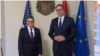 U.S. diplomat Derek Chollet (left) with Serbian President Aleksandar Vucic in Belgrade on January 12.