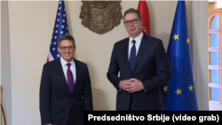 U.S. diplomat Derek Chollet (left) with Serbian President Aleksandar Vucic in Belgrade on January 12.