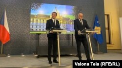 Prime Minister Albin Kurti (left) handed Pristina's application to the Czech minister for European affairs, Mikulas Bek (right) at a ceremony in Prague on December 15.