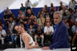 مهدی بجستانی و زهرا امیرابراهیمی در مراسم عکس گروهی فیلم عنکبوت مقدس در جشنواره کن