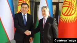 Владимир Норов жана  Жээнбек Кулубаев.