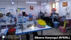 Тигүү ишканасы. Иллюстрациялык сүрөт.