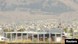 Turkey - An Armenian cargo plane bound for Syria sits on the tarmac after landing at Erzurum airport to be searched by Turkish authorities, 15Oct2012. 