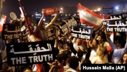 معترضان لبنانی در تظاهراتی در دسامبر سال ۲۰۰۵ خواستار کشف حقیقت در مورد ترور رفیق حریری بودند.