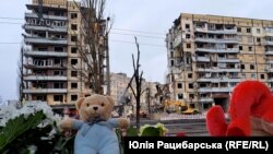 A memorial to the victims is seen at the site of a missile attack in Dnipro on January 18.