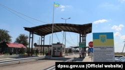 Krym bilen aradaky administratiw çäk. Kalançak barlag nokady. Ukraina, 2018