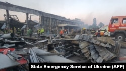 Последствия российского ракетного удара по торговому центру в городе Кременчуг, 27 июня 2022 года