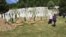 Coffins with the remains of 50 victims of the Srebrenica genocide who were recently identified were buried on July 11.