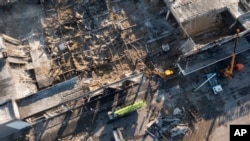 Кременчуг шаарындагы соода борбору соккудан кийин. 28-июнь, 2022-жыл.