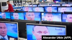 ՌԴ նախագահ Վլադիմիր Պուտինը հեռուստաէկրաններին: 