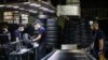 Workers at a tire company (illustrative photo)