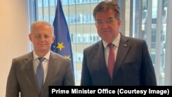Kosovar Deputy Prime Minister Besnik Bislimi (left) and the EU's special envoy for the Kosovo-Serbia dialogue, Miroslav Lajcak, met in Bratislava on July 11.