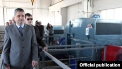 Armenia - Prime Minister Tigran Sarkisian (L) and Patrick Fine, vice-president of the U.S. Millennium Challenge Corporation, visit a newly constructed pumping station in Ararat province, 03Oct2011.