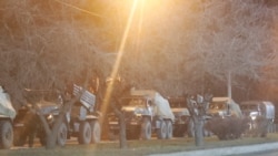 Вайсковы аўтамабіль на ўскраіне Данецку, 23 лютага 2022 году