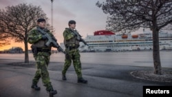Swedish soldiers patrol in Visby harbor on the Baltic Sea island of Gotland amid increased tensions with Russia. (file photo)