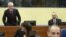 Serbia's former secret police chief Jovica Stanisic (left) and his former deputy Franko Simatovic (right) sit in the court prior to the trial chamber judgement hearing at the International Criminal Tribunal for the former Yugoslavia in The Hague on May 30, 2013.