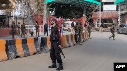 Пакистандын күч түзүмүндө иштегендер. 