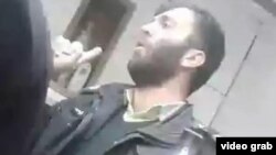 تصویری از بهنام زارعی که از تحمیل حجاب اجباری خودداری کرد