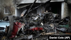 The State Emergency Service helicopter crashed in foggy conditions into a kindergarten and the surrounding residential area of Brovary near Kyiv on January 18. 