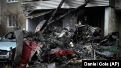 بالگرد حامل یوگنی ینین که روز ۲۸ دی در شهر بروواری اوکراین سقوط کرد