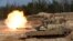 A U.S. M1A1 Abrams tank fires during NATO military exercises in Latvia in 2021. Washington said 31 of the battle tanks would be sent to Ukraine.