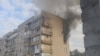 Пожежа внаслідок бойових дій у житловому будинку міста Буча, північно-західний напрямок від Києва, 27 лютого 2022 року